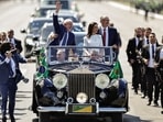 Brazil's President elect Luiz Inacio Lula da Silva waves to supporters on the day of his swearing-in ceremony, in Brasilia, Brazil.