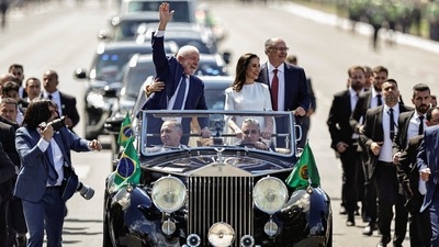Brazil's President elect Luiz Inacio Lula da Silva waves to supporters on the day of his swearing-in ceremony, in Brasilia, Brazil. (REUTERS)
