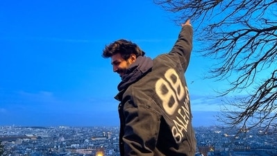 Kartik Aaryan ushered in New Year 2023 with a picturesque photo of himself from Paris. He captioned the image "1.1.23. Let's embrace and Conquer 2023." 