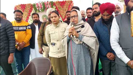 Sidhu Moose Wala’s mother Charan Kaur addressing people at Moosa village on Sunday. (HT photo)