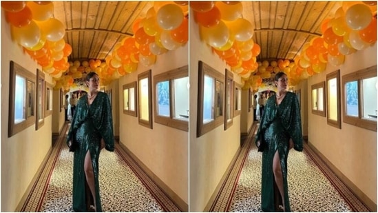 Kareena, for the special day, sported a gorgeous green sequin dress as she posed for a photo against a backdrop decorated with balloons.  (Instagram/@kareenakapoorkhan)