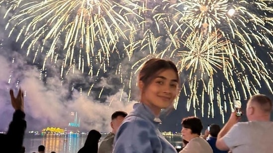 Pooja Hegde posed in front of fireworks display on a beach, and shared her pictures with the caption, “Relaxed, happy and all things magical 2023.”