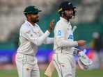 Babar Azam pats Devon Conway's back(AFP) Babar Azam pats Devon Conway's back(AFP)
