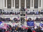 Insurrectionists loyal to the then President Donald Trump breach the Capitol in Washington on January 6, 2021. 