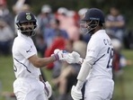 Virat Kohli batting with Cheteshwar Pujara (R)(AP) Virat Kohli batting with Cheteshwar Pujara (R)(AP)