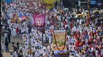 Jain community members take part in a protest in Ahmedabad on Sunday against the decision declaring Shri Sammed Shikharji in Jharkhand as a tourist place. (PTI) Jain community members take part in a protest in Ahmedabad on Sunday against the decision declaring Shri Sammed Shikharji in Jharkhand as a tourist place. (PTI)