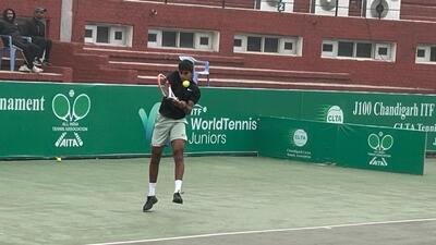 A player in action at the Chandigarh ITF meet inSector 10. (HT Photo)