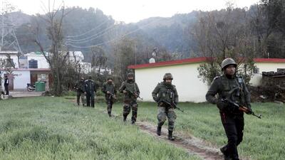 Army personnel conducting searches after the killing of the four civilians. (PTI) Army personnel conducting searches after the killing of the four civilians. (PTI)