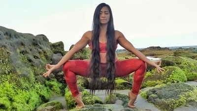 3. Kaliasana - With your toes angled outward, spread your feet widely. Squat down to a low, deep squat. Straighten your back at all times. As you raise your arms, make sure they are parallel to your shoulders. Your elbows should be bent, and your palms should be facing the sky.&nbsp; (Twitter/shadowoneone)