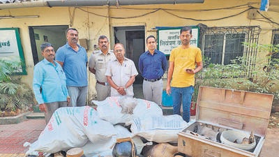 Forest officials with the skins that were seized on December 31. (HT Photo) Forest officials with the skins that were seized on December 31. (HT Photo)