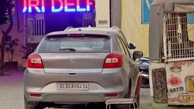 Grey Baleno identified by police that dragged woman for 7 km in Sultanpuri causing her death (ANI Photo) Grey Baleno identified by police that dragged woman for 7 km in Sultanpuri causing her death (ANI Photo)