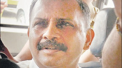 Navi Mumbai: Lt Col Shrikant Prasad Purohit, who was granted bail by the Supreme Court on Monday in the 2008 Malegaon blast case, being taken to the Sessions Court from Taloja Jail in Navi Mumbai on Tuesday. PTI Photo (PTI8_22_2017_000142B) (PTI) Navi Mumbai: Lt Col Shrikant Prasad Purohit, who was granted bail by the Supreme Court on Monday in the 2008 Malegaon blast case, being taken to the Sessions Court from Taloja Jail in Navi Mumbai on Tuesday. PTI Photo (PTI8_22_2017_000142B) (PTI)