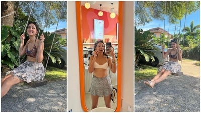 Ananya also posted pictures of herself enjoying on a swing and a mirror selfie from an ice cream shop. While the first and last picture shows her dressed in an embellished crop top and printed skirt, in the second click she wore a white bralette and frilled mini skirt. (Instagram) Ananya also posted pictures of herself enjoying on a swing and a mirror selfie from an ice cream shop. While the first and last picture shows her dressed in an embellished crop top and printed skirt, in the second click she wore a white bralette and frilled mini skirt. (Instagram)