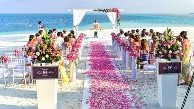Considering destination weddings are typically held in remote locations, the wedding planning, catering, and other factors influencing the wedding's image can be complex. (pexels)