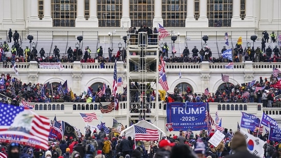 Insurrectionists loyal to the then President Donald Trump breach the Capitol in Washington on January 6, 2021. (AP)