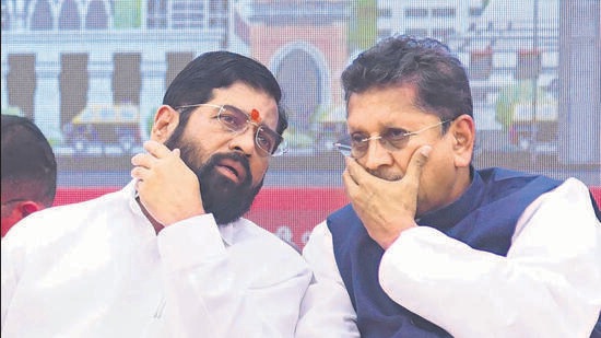 Mumbai: Maharashtra Chief Minister Eknath Shinde with Deputy Chief Minister Devendra Fadnavis and Maharashtra Minister Deepak Kesarkar during the foundation stone laying ceremony of various development works in eastern and western suburbs under the Mumbai beautification project, in Mumbai, Saturday, Dec. 10, 2022. (PTI Photo) (PTI12_10_2022_000129B) (PTI) Mumbai: Maharashtra Chief Minister Eknath Shinde with Deputy Chief Minister Devendra Fadnavis and Maharashtra Minister Deepak Kesarkar during the foundation stone laying ceremony of various development works in eastern and western suburbs under the Mumbai beautification project, in Mumbai, Saturday, Dec. 10, 2022. (PTI Photo) (PTI12_10_2022_000129B) (PTI)