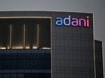 The logo of the Adani Group is seen on the facade of one of its buildings on the outskirts of Ahmedabad, India. (File image)