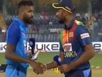 Hardik Pandya and Dasun Shanaka during toss. Hardik Pandya and Dasun Shanaka during toss.