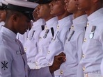 A sailor inspects the uniform of members of the ceremonial honor guards of the crew during the commissioning of INS Mormugao, the second stealth guided missile destroyer of Project 15B, into the Indian Navy, at the Naval Dockyard in Mumbai on December 18, 2022. (Photo by Indranil MUKHERJEE / AFP)(AFP) A sailor inspects the uniform of members of the ceremonial honor guards of the crew during the commissioning of INS Mormugao, the second stealth guided missile destroyer of Project 15B, into the Indian Navy, at the Naval Dockyard in Mumbai on December 18, 2022. (Photo by Indranil MUKHERJEE / AFP)(AFP)