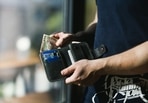 A branded wallet for men makes for a great utility plus fashion accessory.