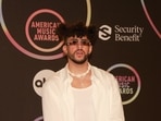 Bad Bunny threw a fan's phone into water while taking a stroll on the streets of the Dominican Republic.
