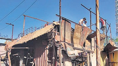 BMC razes 55 unauthorised structures in Bhandup for GMLR