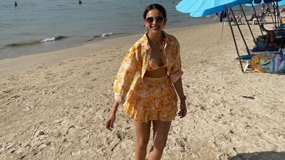 Rakul Preet kept her look simple yet trendy and accessorised her beach outfit by a pair of vintage sunglasses. (Instagram/@rakulpreet) Rakul Preet kept her look simple yet trendy and accessorised her beach outfit by a pair of vintage sunglasses. (Instagram/@rakulpreet)