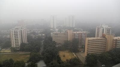 A thick layer of smog engulfs the national capital on a cold winter morning in New Delhi. (PTI Photo) A thick layer of smog engulfs the national capital on a cold winter morning in New Delhi. (PTI Photo)