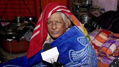 Dogs and their octogenarian caretaker, Pratima Devi, in New Delhi on Tuesday. (ANI) Dogs and their octogenarian caretaker, Pratima Devi, in New Delhi on Tuesday. (ANI)