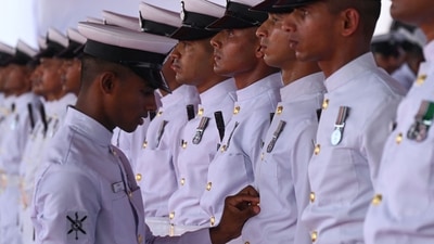 A sailor inspects the uniform of members of the ceremonial honor guards of the crew during the commissioning of INS Mormugao, the second stealth guided missile destroyer of Project 15B, into the Indian Navy, at the Naval Dockyard in Mumbai on December 18, 2022. (Photo by Indranil MUKHERJEE / AFP) (AFP) A sailor inspects the uniform of members of the ceremonial honor guards of the crew during the commissioning of INS Mormugao, the second stealth guided missile destroyer of Project 15B, into the Indian Navy, at the Naval Dockyard in Mumbai on December 18, 2022. (Photo by Indranil MUKHERJEE / AFP) (AFP)