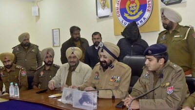 Ludhiana police commissioner Mandeep Sidhu discussing Pandit’s arrest on Tuesday. (Gurpreet Singh/HT)