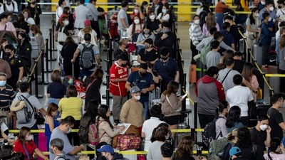 Philippines Airport Outage: Passengers queue at an airline counter in the Ninoy Aquino International Airport, in Pasay City, Metro Manila, Philippines. (Reuters)