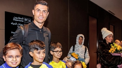 Cristiano Ronaldo poses for picture with Saudi children (AFP)
