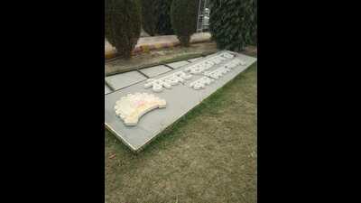 The board bearing the war hero’s name lying in a nearby park. (Sourced)