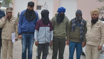The carjacking accused in police custody in Mohali on Tuesday. (Sanjeev Sharma/HT)