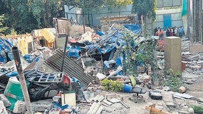 The civic body had declared the Shiv Mahal Society, on Mathuradas Road, Kandivali West, dangerous for habitation on August 25 and ordered its demolition. However, to the dismay of Devi Bhuvan Chawl residents, their nine houses were bulldozed by the developer, rendering them homeless, on December 19. (HT PHOTO) The civic body had declared the Shiv Mahal Society, on Mathuradas Road, Kandivali West, dangerous for habitation on August 25 and ordered its demolition. However, to the dismay of Devi Bhuvan Chawl residents, their nine houses were bulldozed by the developer, rendering them homeless, on December 19. (HT PHOTO)
