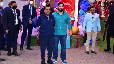 Prithvi's grandfather, Mukesh Ambani also joined the celebrations. He posed for the paparazzi with his son.&nbsp; (HT Photo/Varinder Chawla)