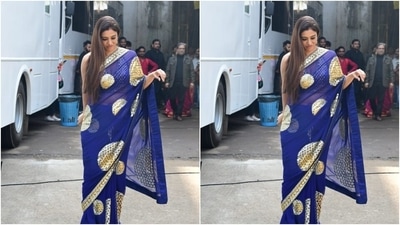 Tabu decked up in a blue chiffon saree decorated in golden resham threads, and featuring a thick golden zari border. She teamed it with a blue halter neck blouse with a plunging neckline and golden sequin details. (HT Photos/Varinder Chawla) Tabu decked up in a blue chiffon saree decorated in golden resham threads, and featuring a thick golden zari border. She teamed it with a blue halter neck blouse with a plunging neckline and golden sequin details. (HT Photos/Varinder Chawla)