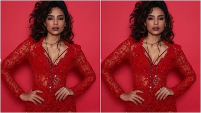 Sobhita's fashion diaries are getting better by the day. The actor, a few days back, shared a slew of pictures of herself looking gorgeous in a bright red translucent lace gown. (Instagram/@sobhitad) Sobhita's fashion diaries are getting better by the day. The actor, a few days back, shared a slew of pictures of herself looking gorgeous in a bright red translucent lace gown. (Instagram/@sobhitad)