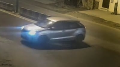 Video grab of a car that reportedly hit a woman and dragged her for a few kilometers, in the Sultanpuri area of Delhi, Sunday, Jan. 1, 2023, which left the woman dead. A day after Delhi police has arrested five accused in this case. (PTI Photo)