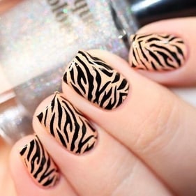 The classic animal prints, such as tiger, leopard, and zebra or you could choose cartoon nail art like a unicorn, panda, minion, and more. (pinterest) The classic animal prints, such as tiger, leopard, and zebra or you could choose cartoon nail art like a unicorn, panda, minion, and more. (pinterest)