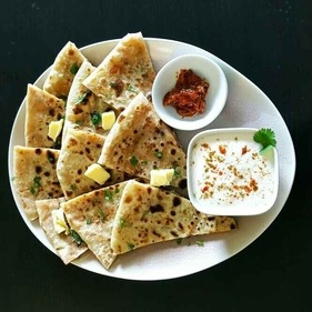Give your traditional aloo paratha a tasty twist by adding cheese. Made with gluten free flour this healthy recipe is a must try. (pinterest) Give your traditional aloo paratha a tasty twist by adding cheese. Made with gluten free flour this healthy recipe is a must try. (pinterest)