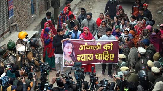 A protest in Anjali Kumari’s neighbourhood of Karan Vihar on Tuesday. (Sanchit Khanna/HT Photo)