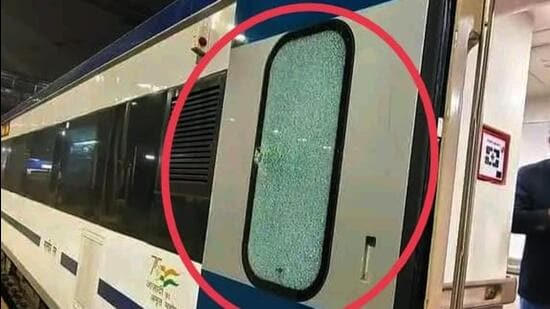 The shattered glass on the door of the Vande Bharat coach on Monday night. (Twitter Photo)
