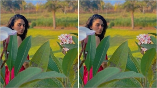 “Happy,” Sobhita captioned her pictures, a she wore her tresses open in wavy curls and posed with her bare feet on the grass.&nbsp;(Instagram/@sobhitad)