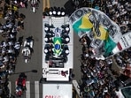 The casket of late Brazilian soccer great Pele is draped in the Brazilian and Santos FC soccer club flags as his remains are transported from Vila Belmiro stadium, where he laid in state, to the cemetery during his funeral procession in Santos, Brazil, Tuesday, Jan. 3, 2023. (AP Photo/Matias Delacroix)(AP) The casket of late Brazilian soccer great Pele is draped in the Brazilian and Santos FC soccer club flags as his remains are transported from Vila Belmiro stadium, where he laid in state, to the cemetery during his funeral procession in Santos, Brazil, Tuesday, Jan. 3, 2023. (AP Photo/Matias Delacroix)(AP)