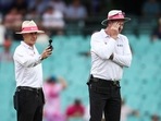 Umpires Chris Gaffaney (L) and Paul Reiffel check a light meter reading during a delay due to bad light on Day 1 of the 3rd Test between Australia and South Africa(AFP) Umpires Chris Gaffaney (L) and Paul Reiffel check a light meter reading during a delay due to bad light on Day 1 of the 3rd Test between Australia and South Africa(AFP)
