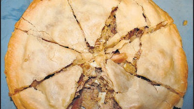 A meat pie made with rabbit and chicken. (REPRESENTATIVE PHOTO) A meat pie made with rabbit and chicken. (REPRESENTATIVE PHOTO)