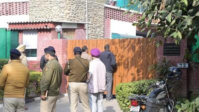 Chandigarh Police personnel standing guard as the special investigation team (SIT) visit Haryana minister Sandeep Singh’s residence in Sector 7 on Wednesday. (Keshav Singh/HT) Chandigarh Police personnel standing guard as the special investigation team (SIT) visit Haryana minister Sandeep Singh’s residence in Sector 7 on Wednesday. (Keshav Singh/HT)