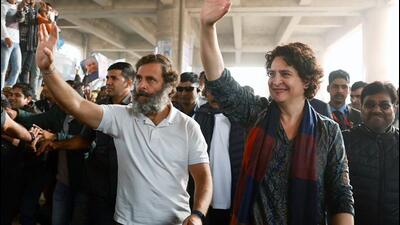 Congress leader Rahul Gandhi with his sister and party general secretary Priyanka Gandhi Vadra wave to supporters while leading the party's Bharat Jodo Yatra as it enters Uttar Pradesh in Ghaziabad on Tuesday. (AICC) Congress leader Rahul Gandhi with his sister and party general secretary Priyanka Gandhi Vadra wave to supporters while leading the party's Bharat Jodo Yatra as it enters Uttar Pradesh in Ghaziabad on Tuesday. (AICC)